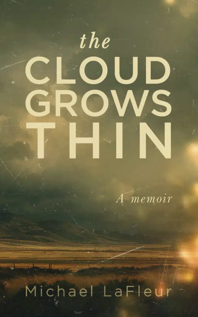 Cover of the memoir The Cloud Grows Thin, showing a moody sky over a rugged terrain in muted golden tones.
